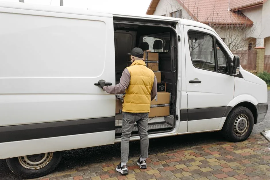 A loaded florist's van with the doors shut