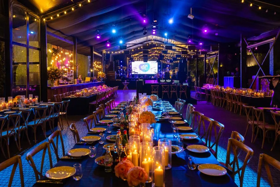 A long tablescape with candles lit